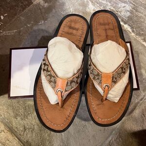 Coach logo flip flops